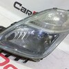 Фара головного света левая б/у для Toyota Prius - 1