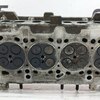 Головка блока цилиндров (ГБЦ) б/у для Opel Combo - 2