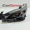 Фара головного света левая б/у для Mazda 6
