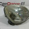 Фара головного света правая б/у для Toyota Vitz - 1