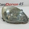 Фара головного света правая б/у для Toyota Vitz