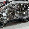 Фара головного света левая б/у для Toyota Corolla - 2