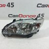 Фара головного света левая б/у для Toyota Corolla
