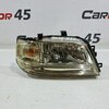 Фара головного света правая б/у для Nissan Cube